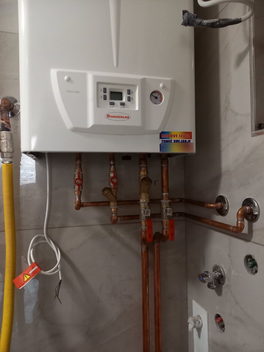 Gasni kotao Immergas sa nalepnicom Radove izveo Tomić Grejanje